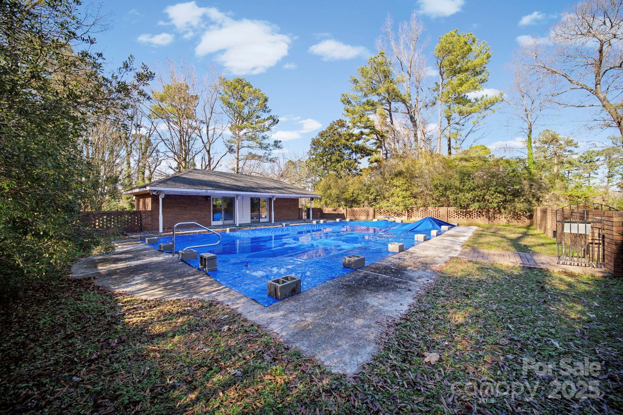 415 Love Lane Rockingham, NC 28379 - Photo 7 of 46 a view of house with outdoor space
