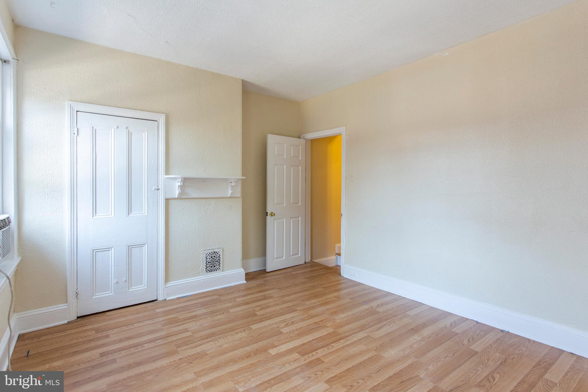 3911 Warren Street Philadelphia, PA 19104 - Photo 16 of 30 a view of empty room with wooden floor and entryway
