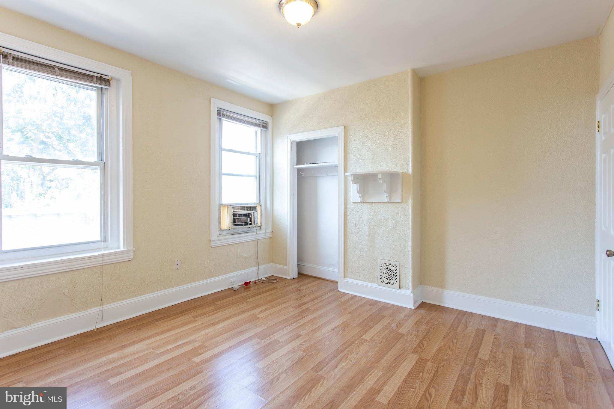 3911 Warren Street Philadelphia, PA 19104 - Photo 23 of 30 a view of an empty room with wooden floor and a window