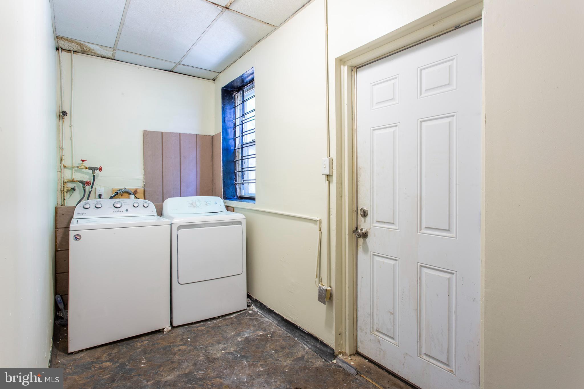3911 Warren Street Philadelphia, PA 19104 - Photo 10 of 30 a utility room with dryer and washer