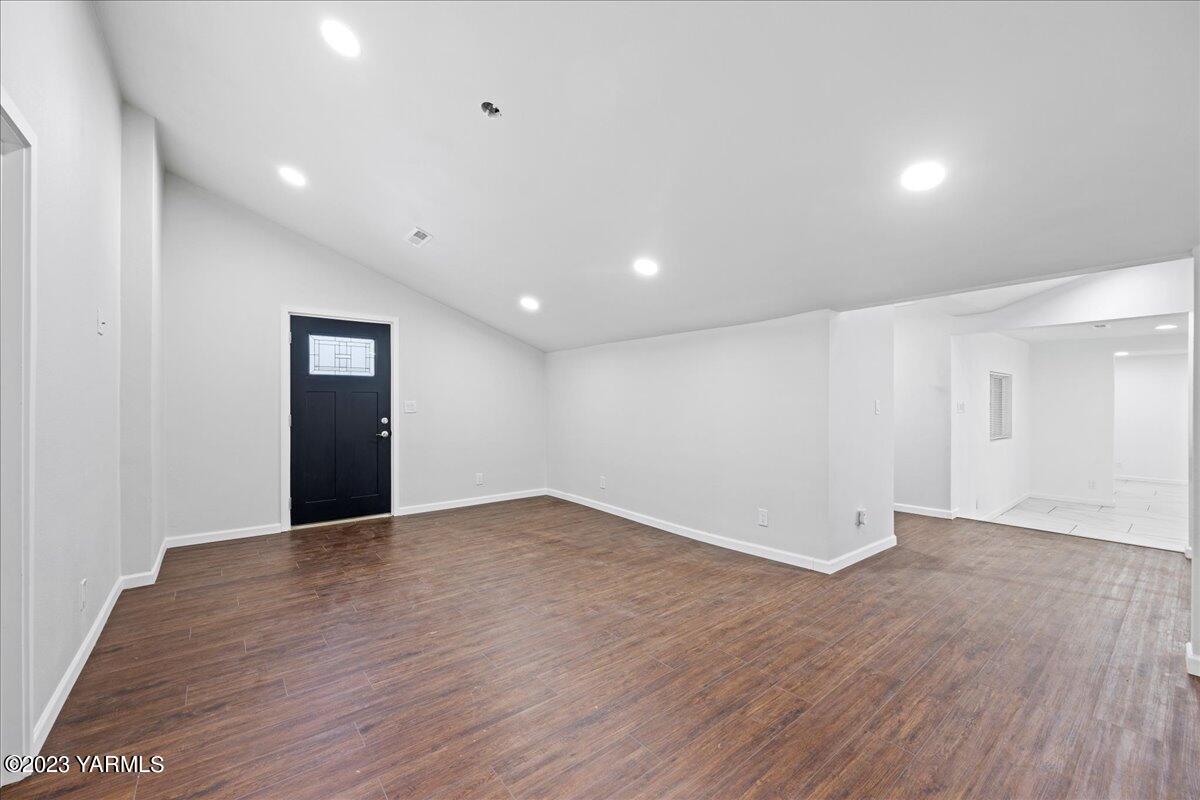 191 Klockhamer Road Naches, WA 98937 - Photo 5 of 28 a view of an empty room with wooden floor