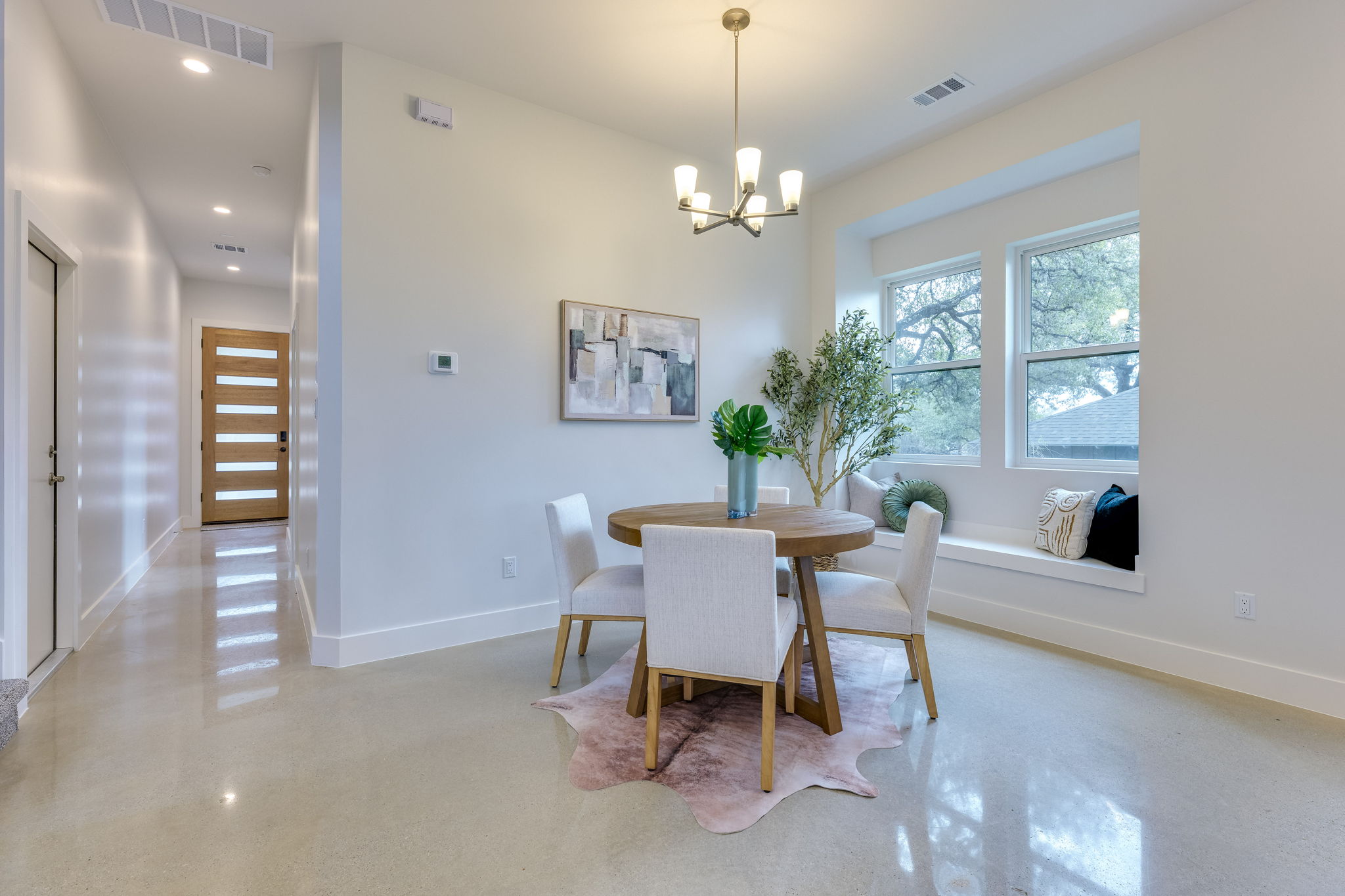 3014 Brass Buttons Trail Austin, TX 78734 - Photo 9 of 35 Large dining area with built in window seat.