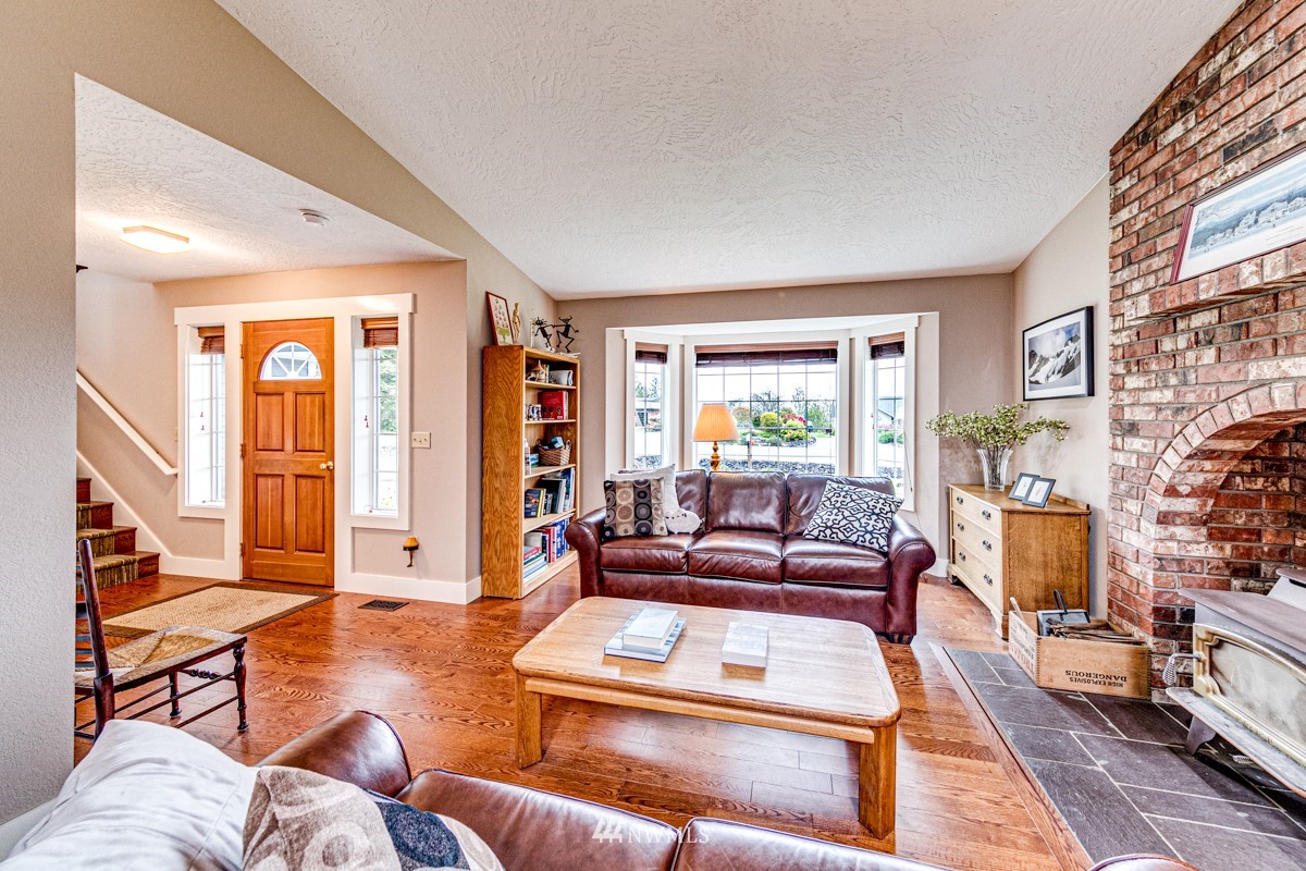 173 View Ridge Drive Port Angeles, WA 98362 - Photo 5 of 27 a living room with furniture and a large window