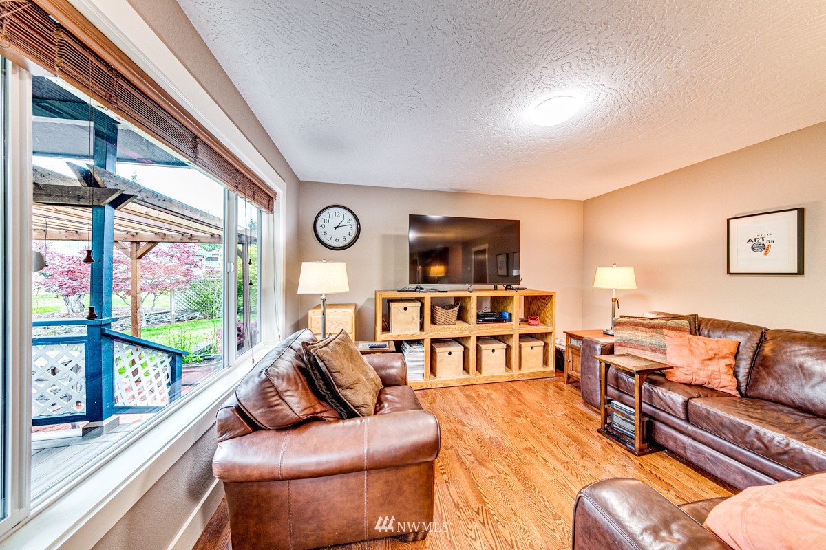173 View Ridge Drive Port Angeles, WA 98362 - Photo 10 of 27 a living room with furniture and a large window