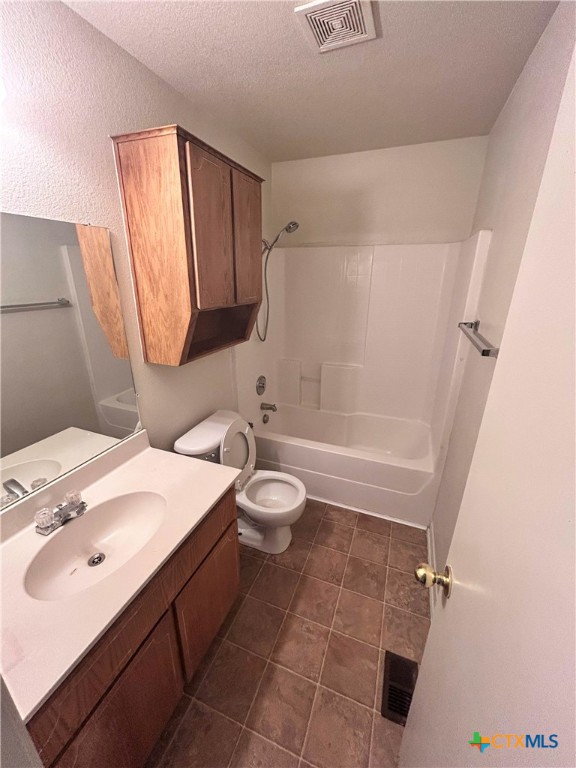 4103 Wine Cup, Unit C Copperas Cove, TX 76522 - Photo 7 of 8 a bathroom with a sink a toilet and shower