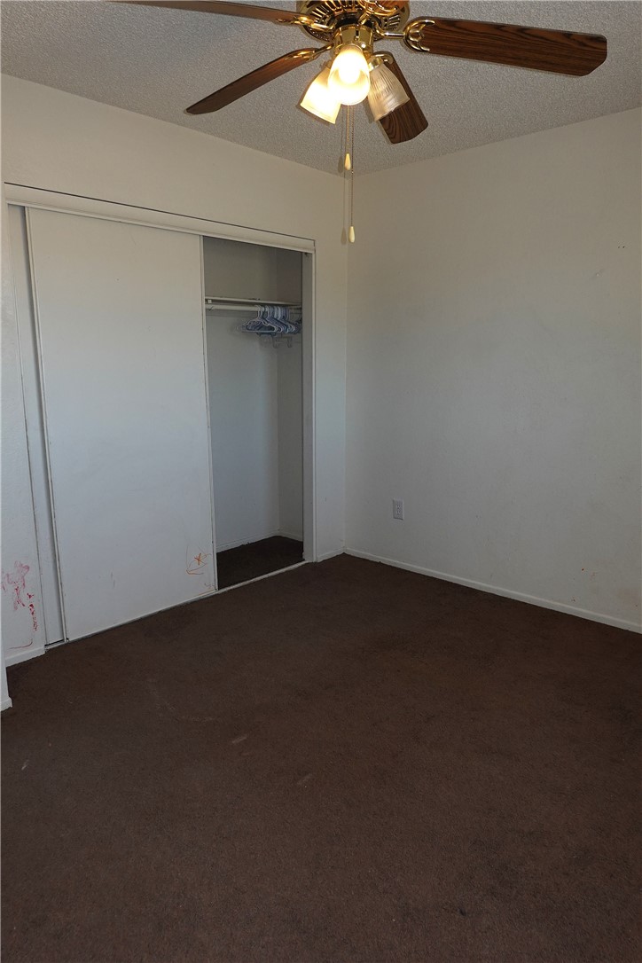 10403 Buckboard Circle Adelanto, CA 92301 - Photo 11 of 20 wooden floor in an empty room