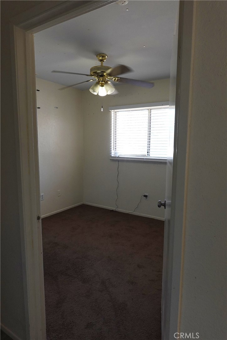 10403 Buckboard Circle Adelanto, CA 92301 - Photo 10 of 20 a view of empty room with window
