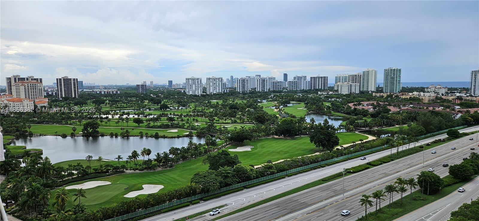 3300 Northeast 191st Street, Unit PH8 Aventura, FL 33180 - Photo 27 of 35 a view of a city with a lake