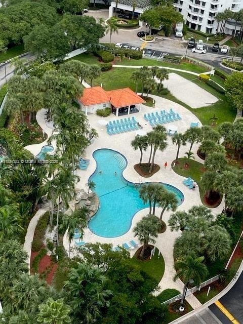 3300 Northeast 191st Street, Unit PH8 Aventura, FL 33180 - Photo 31 of 35 an aerial view of a swimming pool a yard and plants
