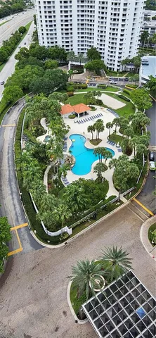 a view of outdoor space with swimming pool and outdoor seating