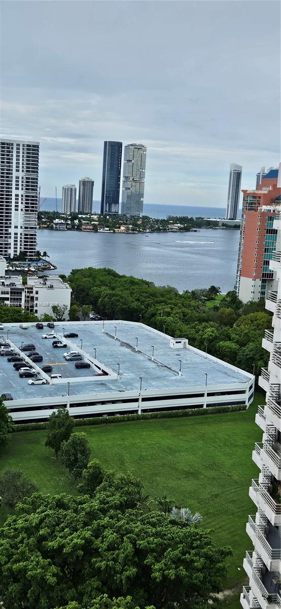 3300 Northeast 191st Street, Unit PH8 Aventura, FL 33180 - Photo 33 of 35 a view of outdoor space with swimming pool and outdoor seating
