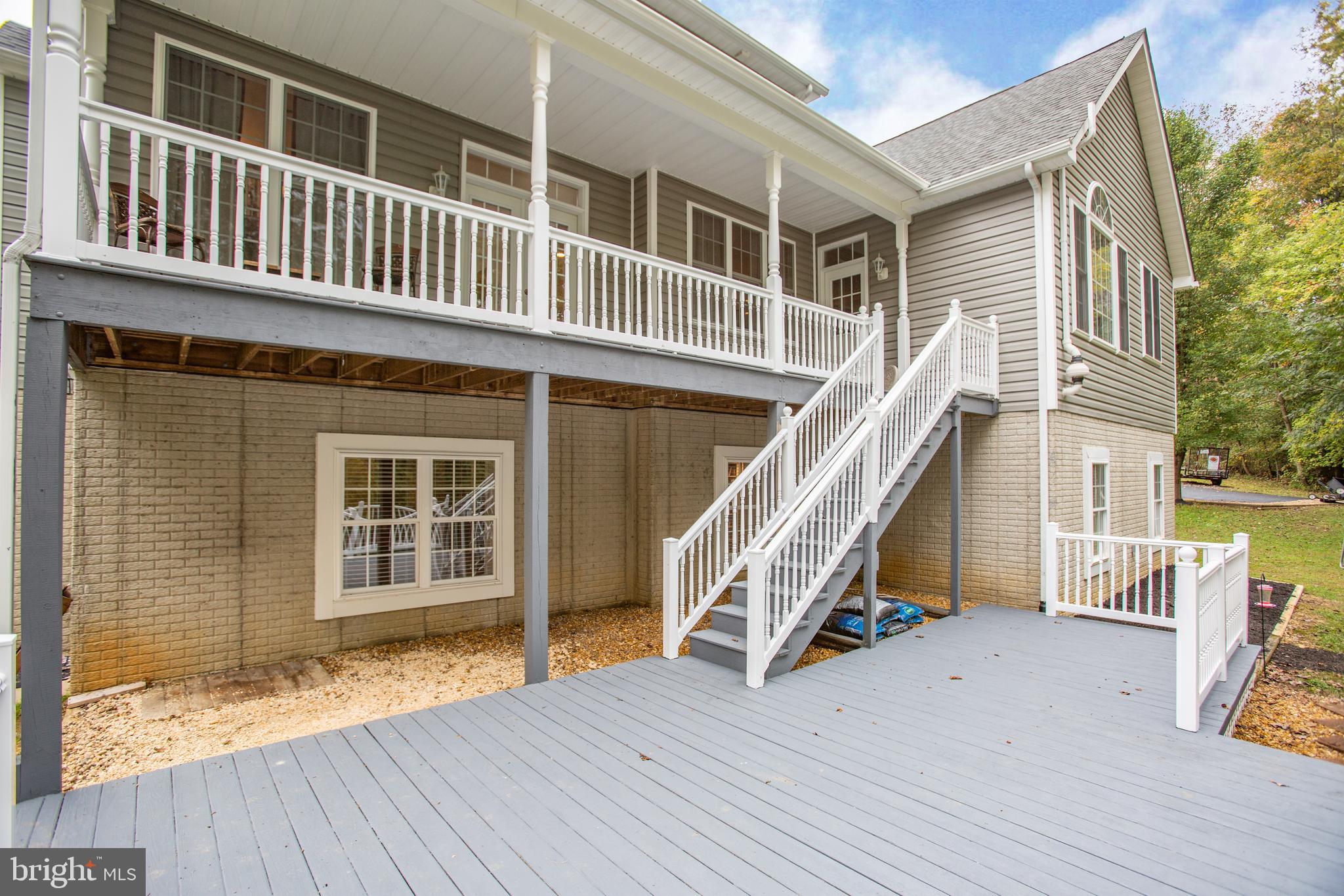 9161 Caledon Road King George, VA 22485 - Photo 45 of 77 Lower deck and back of home