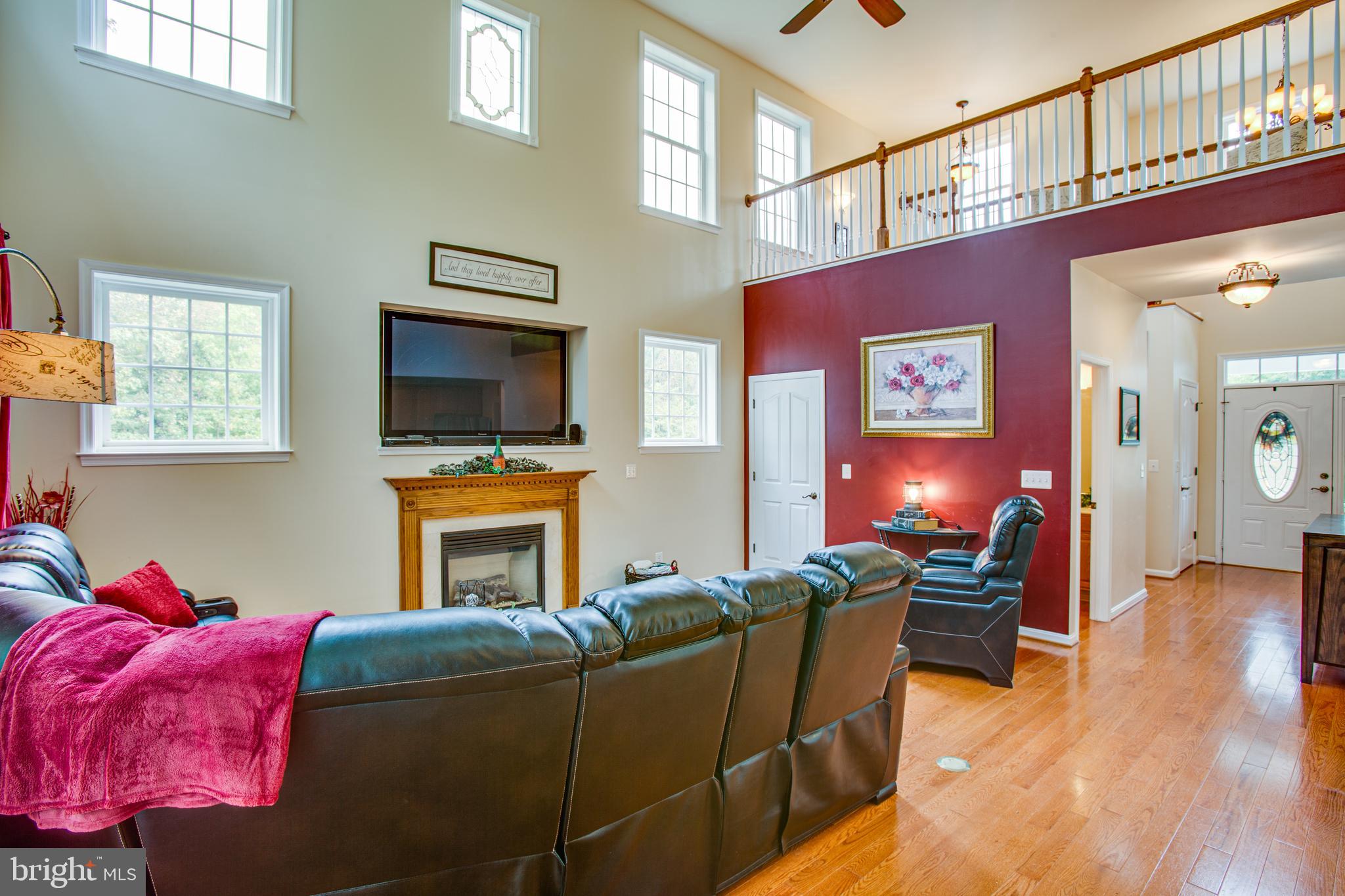 9161 Caledon Road King George, VA 22485 - Photo 8 of 77 Family room with upstairs balcony