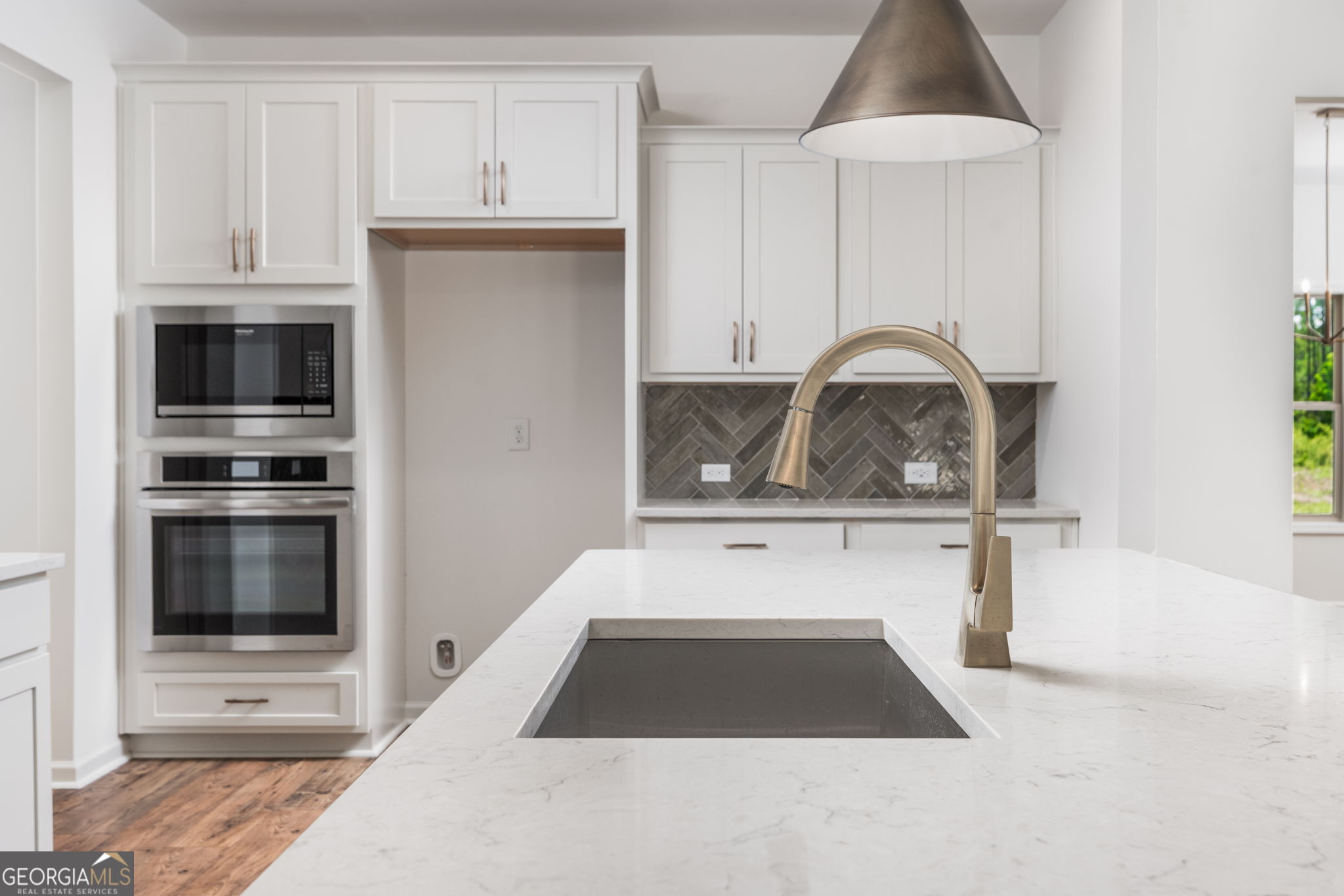 297 Bishop Road Meansville, GA 30256 - Photo 19 of 77 a kitchen with a refrigerator and a stove