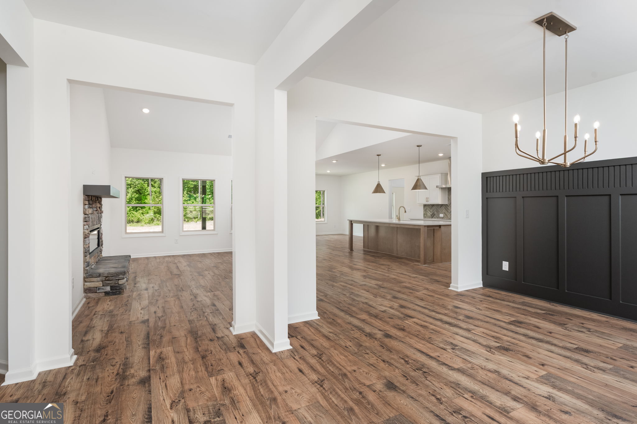 297 Bishop Road Meansville, GA 30256 - Photo 5 of 77 wooden floor in an empty room with a window