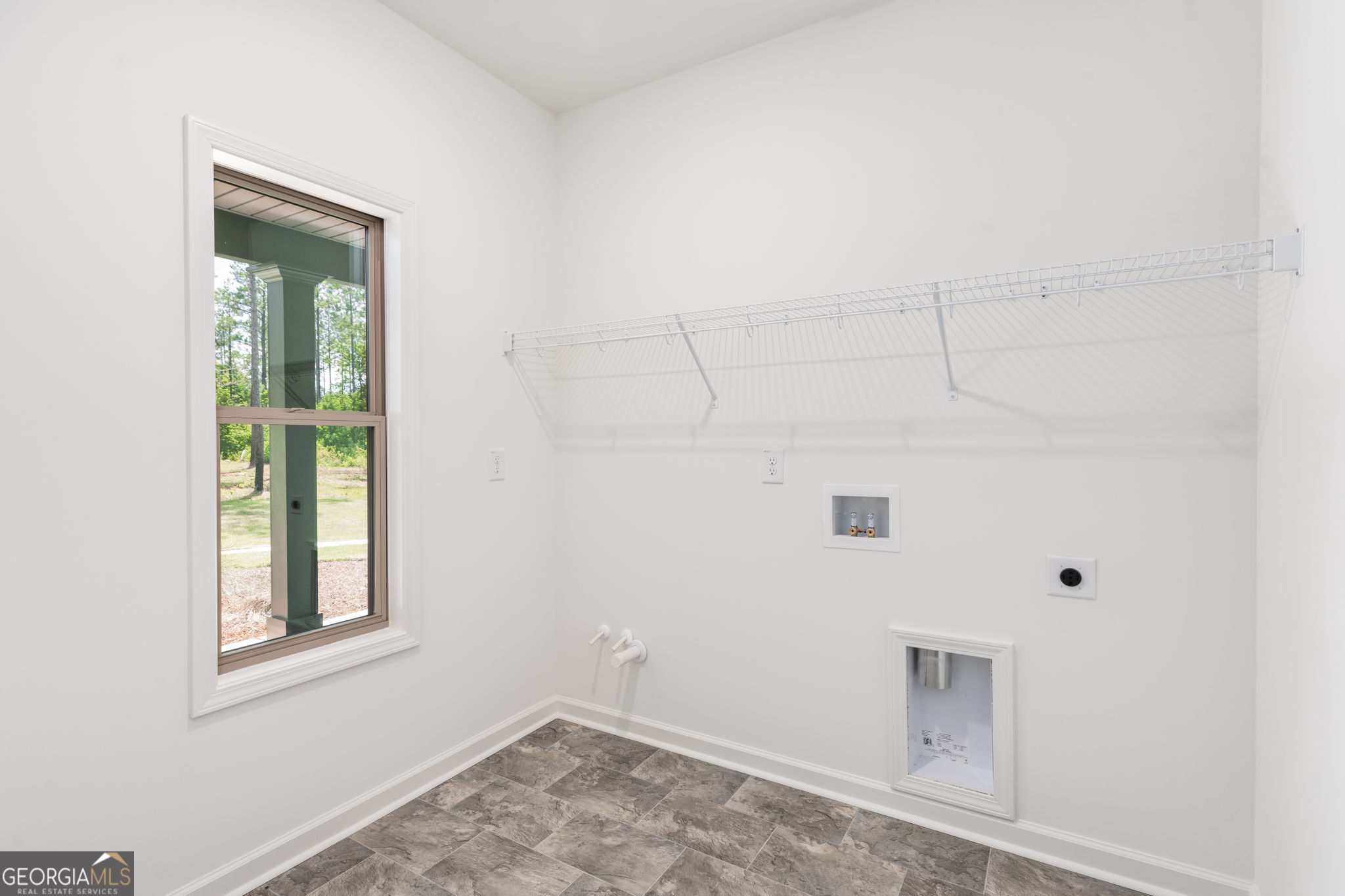 297 Bishop Road Meansville, GA 30256 - Photo 55 of 77 a view of a small space with wooden floor and windows