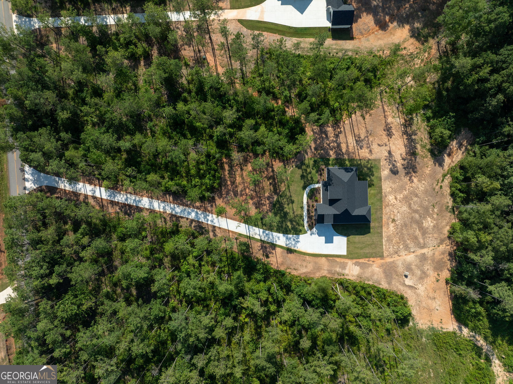 297 Bishop Road Meansville, GA 30256 - Photo 77 of 77 an aerial view of a house with a yard basket ball court and outdoor seating