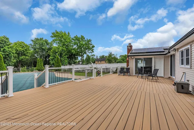 a balcony with hardwood floor