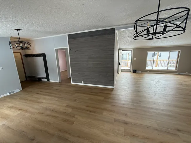 a view of a livingroom with a hardwood floor