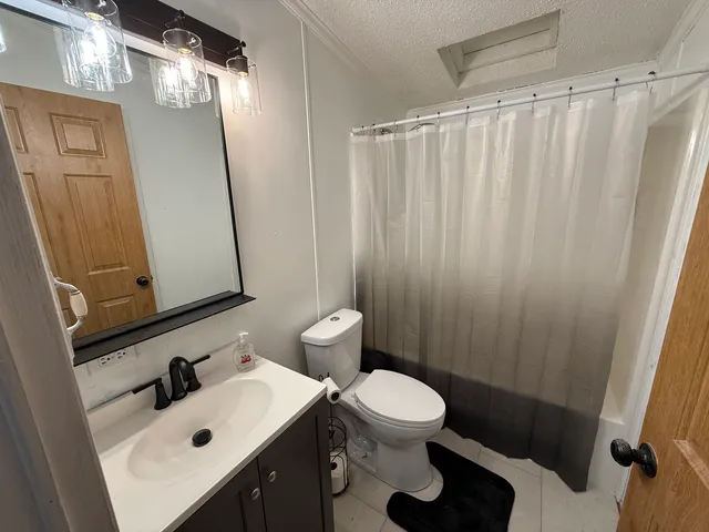 a bathroom with a sink and a toilet
