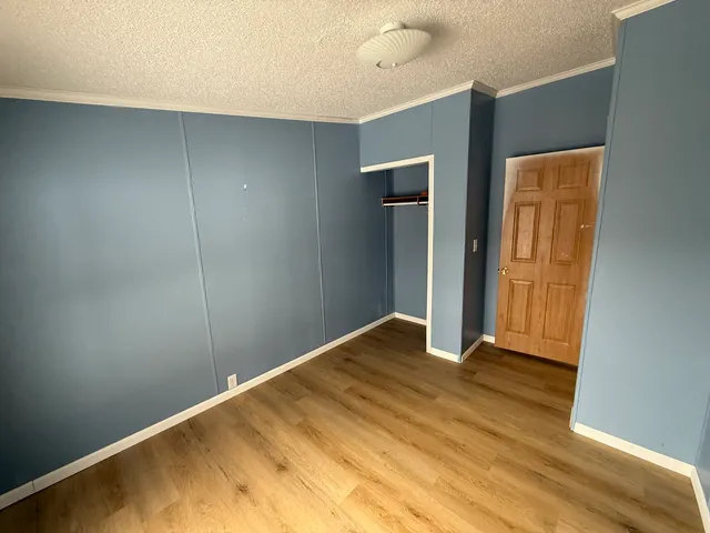 an empty room with closet