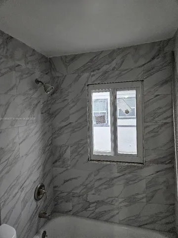 a bathroom with a window