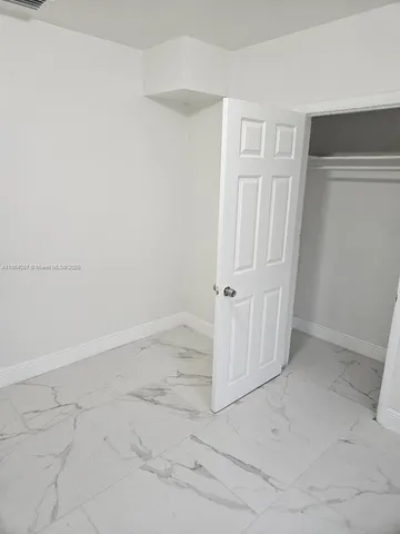 an empty room with a door