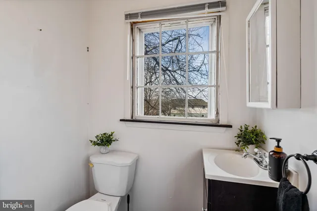 a view of room with window and workspace