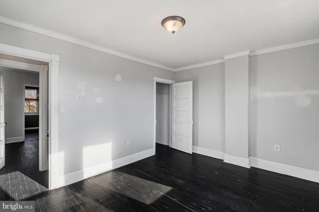 a bath room with a sink and a mirror