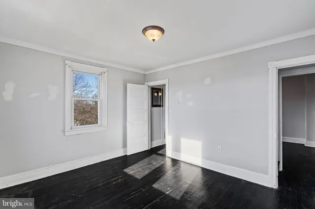 a bathroom with a bathtub a toilet and a shower
