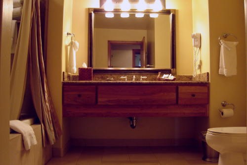 500 Village Road, Unit 206 317 Breckenridge, CO 80424 - Photo 9 of 10 a bathroom with a sink and a mirror