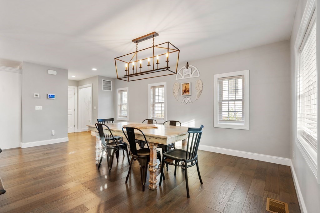 336 Grattan Street Fall River, MA 02721 - Photo 3 of 25 a view of a dining room with furniture window and wooden floor