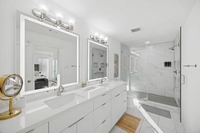 3029 Bering Drive Houston, TX 77057 - Photo 5 of 12 a bathroom with a double vanity sink mirror double and shower