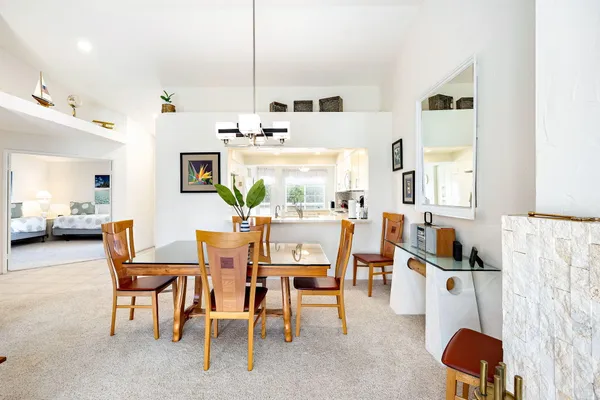 a view of a living room and dining room