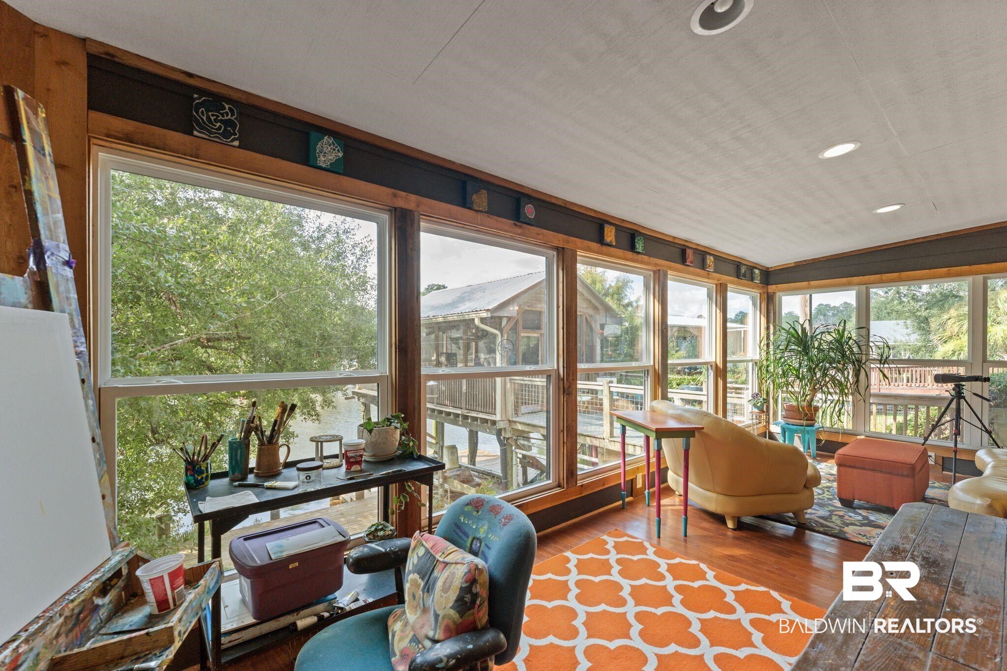 16451 Honey Road Summerdale, AL 36580 - Photo 13 of 55 Sunroom / solarium featuring wood finished floors, recessed lighting, and vaulted ceiling