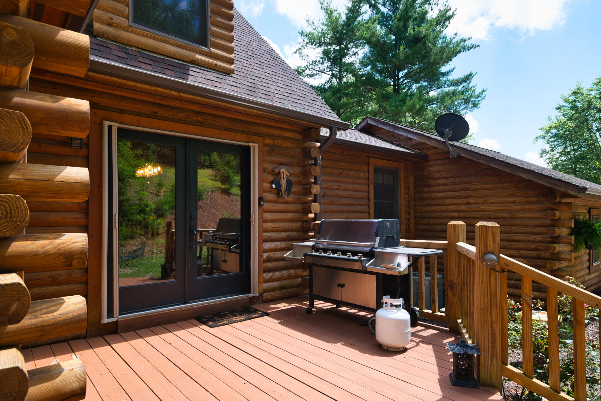 567 Weeks Road Northwest Floyd, VA 24091 - Photo 20 of 71 a backyard of a house with barbeque oven and outdoor seating