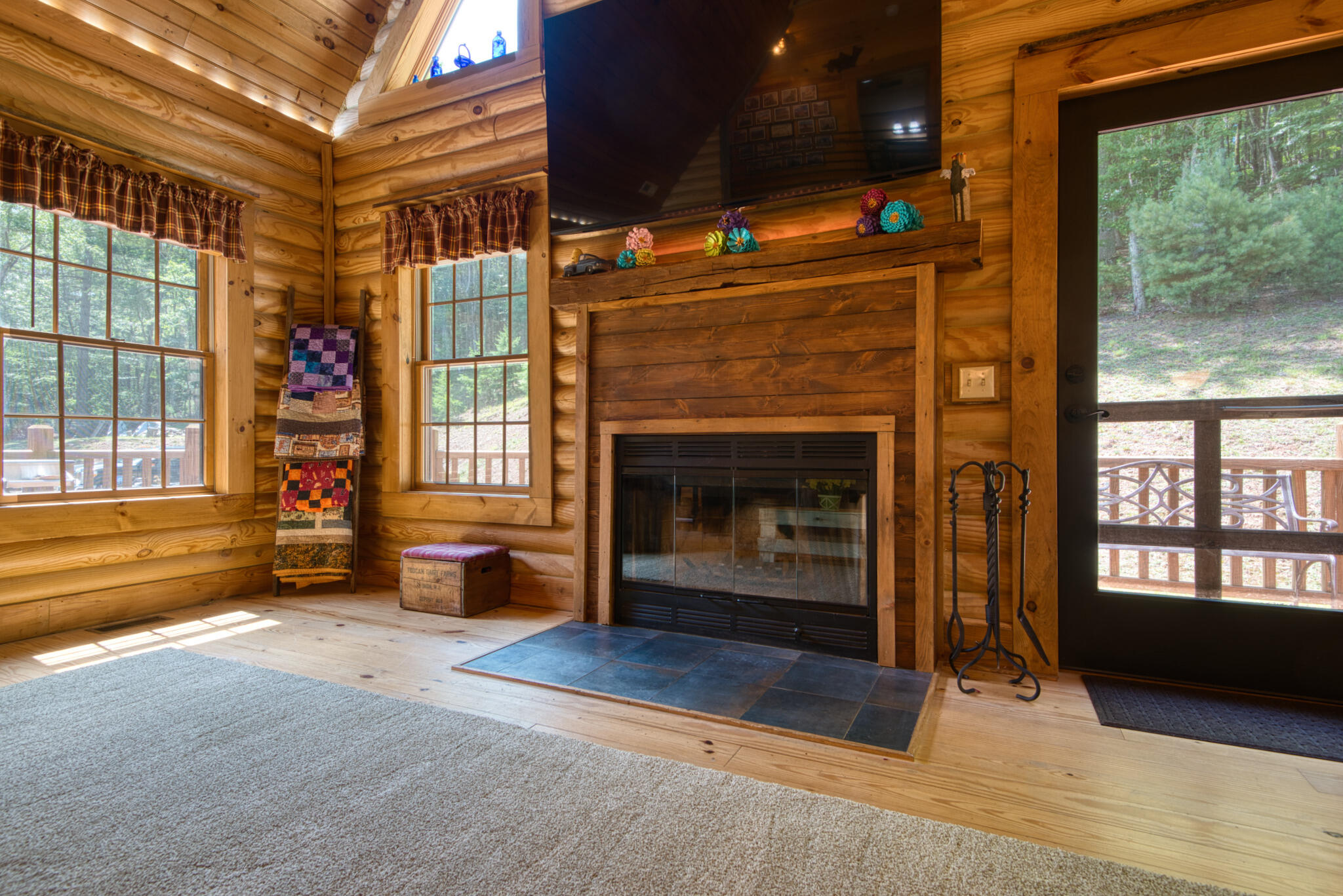 567 Weeks Road Northwest Floyd, VA 24091 - Photo 25 of 71 a living room with furniture window and a fireplace