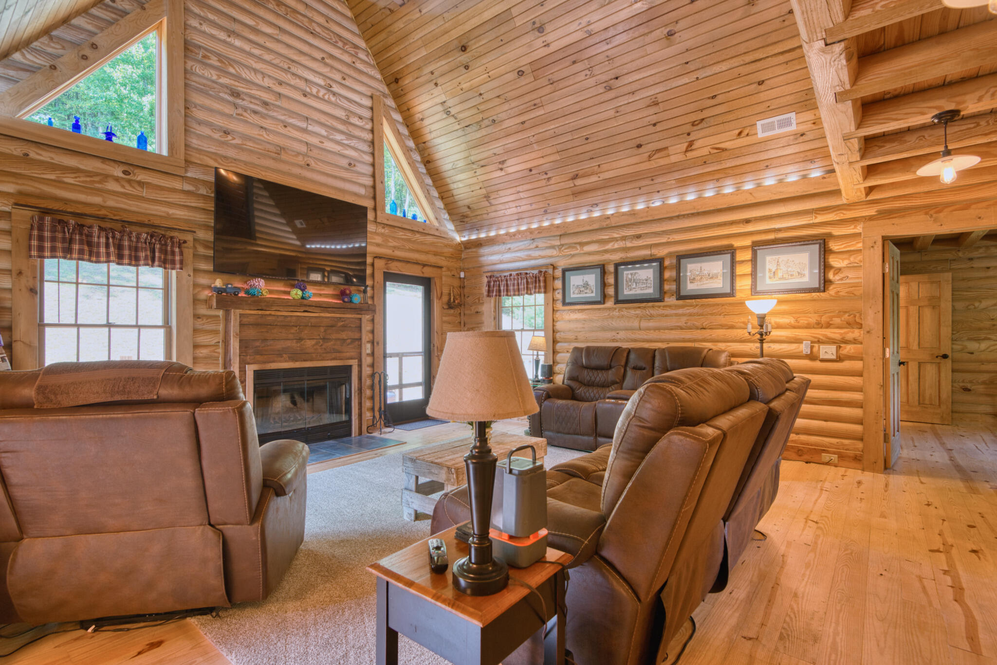 567 Weeks Road Northwest Floyd, VA 24091 - Photo 27 of 71 a living room with furniture a fireplace and a table