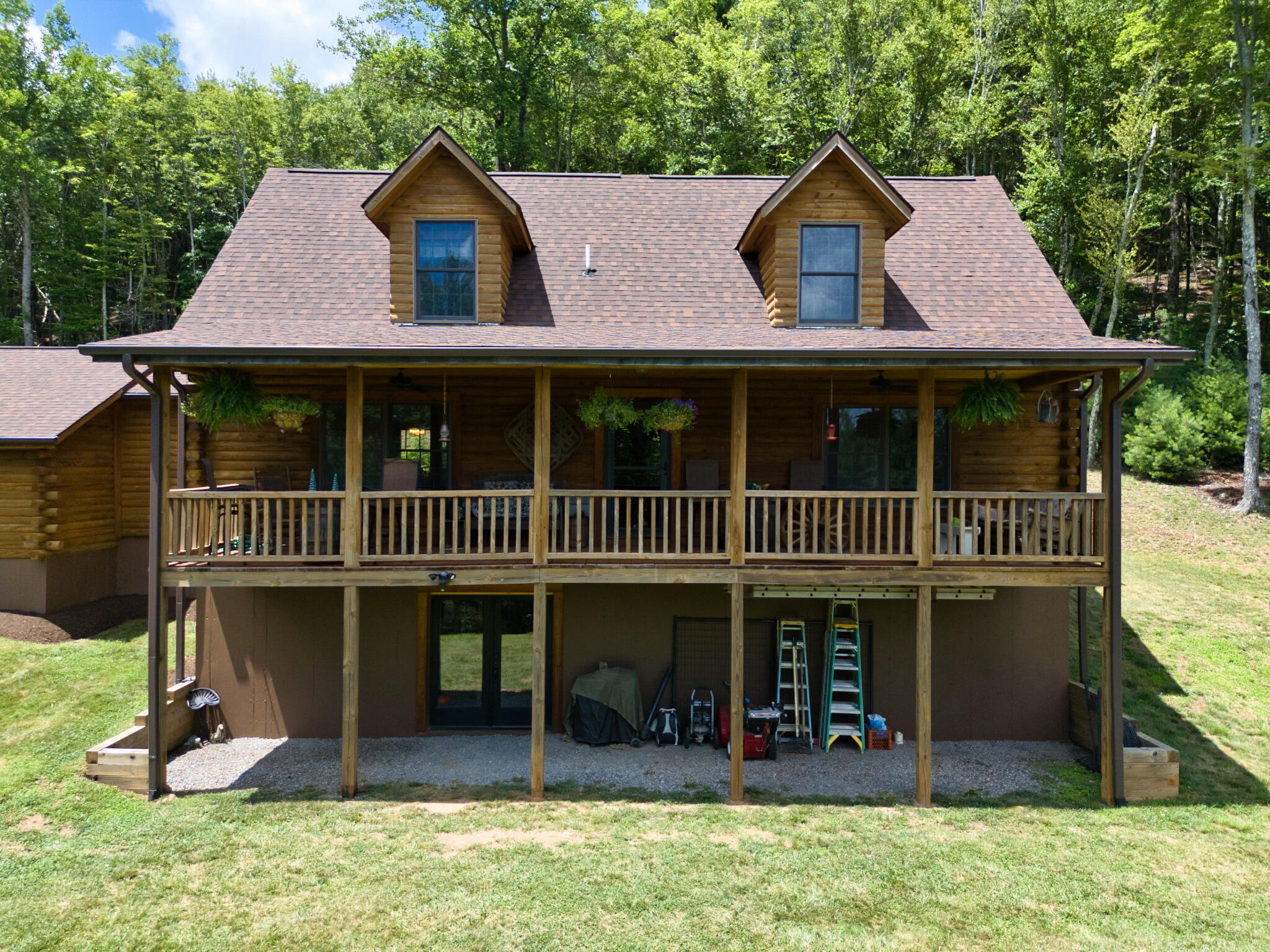 567 Weeks Road Northwest Floyd, VA 24091 - Photo 4 of 71 an outdoor view of a house with a garden