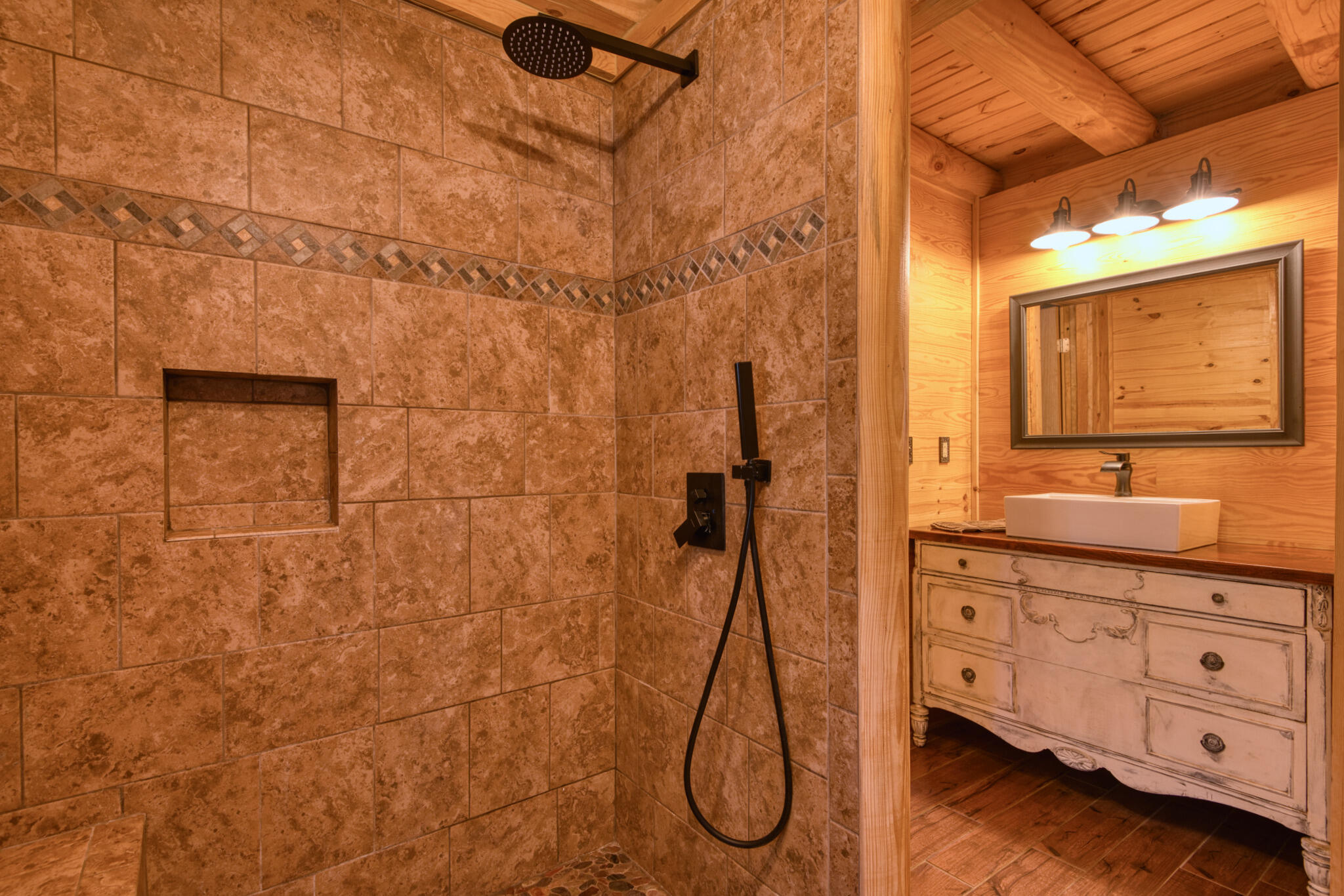 567 Weeks Road Northwest Floyd, VA 24091 - Photo 45 of 71 a bathroom with a granite countertop sink a shower and a mirror