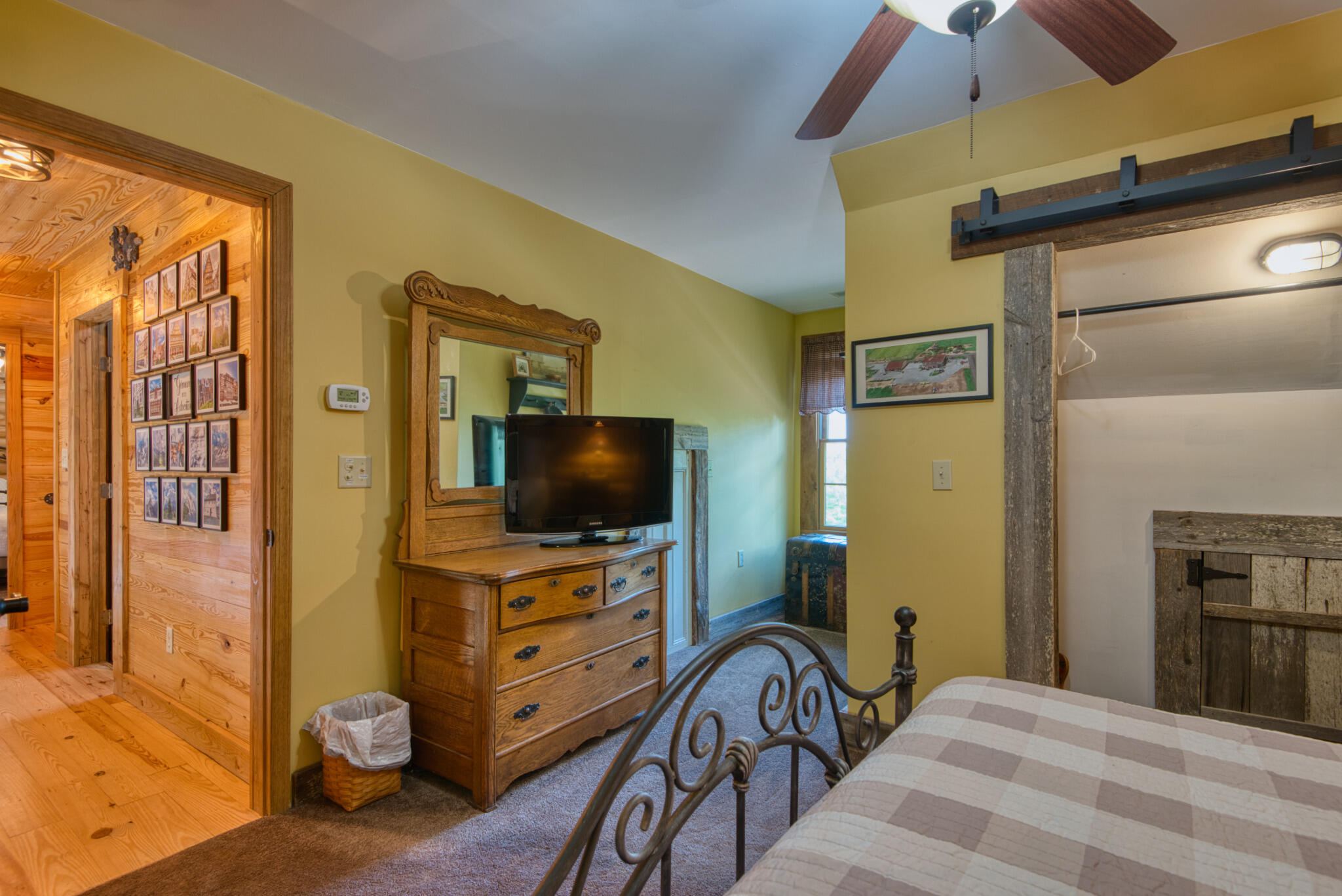 567 Weeks Road Northwest Floyd, VA 24091 - Photo 54 of 71 a bedroom with a bed and a flat screen tv
