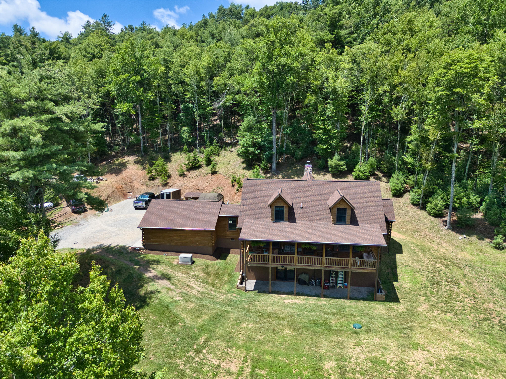 567 Weeks Road Northwest Floyd, VA 24091 - Photo 8 of 71 an aerial view of a house with a garden and deck