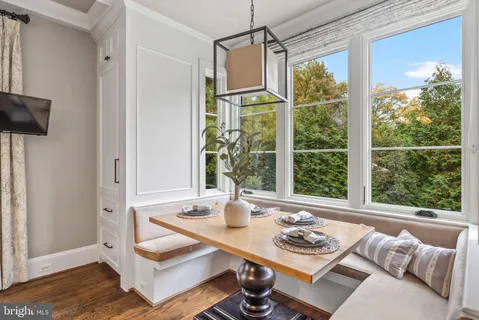 a spacious bathroom with a shower sink and mirror
