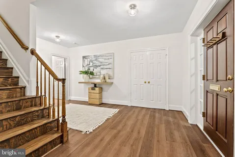 a view of yard with swimming pool and green space