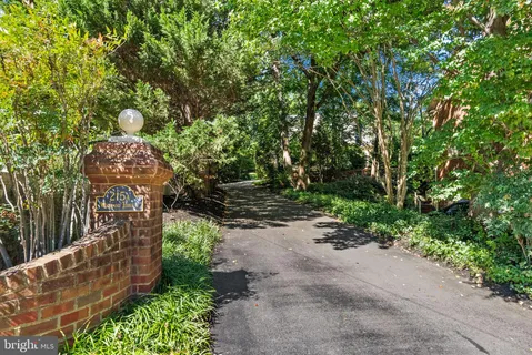 a bedroom with a bed and a cabinets