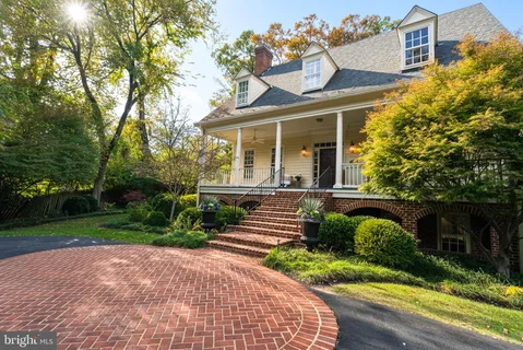 a picture of a bathroom with a shower and a mirror
