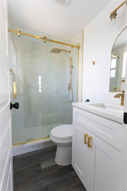 6340 Westport Drive Port Richey, FL 34668 - Photo 24 of 51 a bathroom with a sink toilet and shower