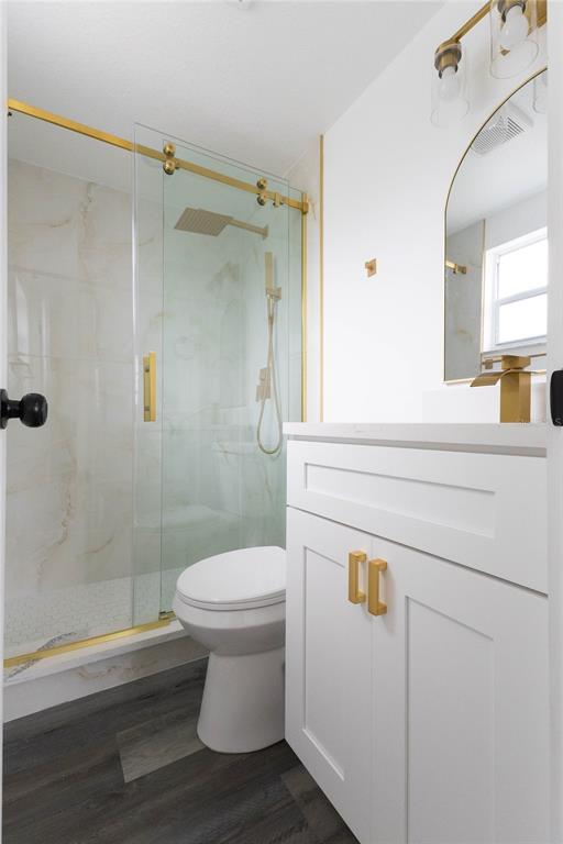 6340 Westport Drive Port Richey, FL 34668 - Photo 25 of 51 a bathroom with a sink a toilet and shower