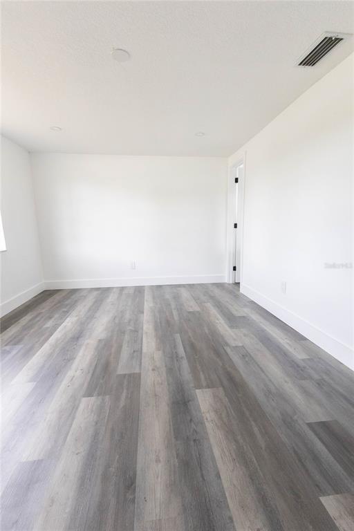 6340 Westport Drive Port Richey, FL 34668 - Photo 32 of 51 wooden floor in a room