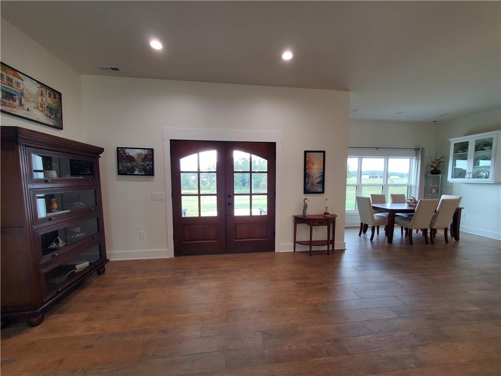 876 Cline Road Resaca, GA 30735 - Photo 13 of 78 a living room with furniture and a flat screen tv with kitchen view